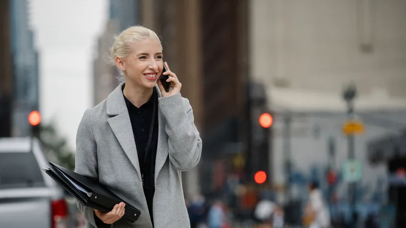 Confident professional woman — Credit Cube personal loan approved
