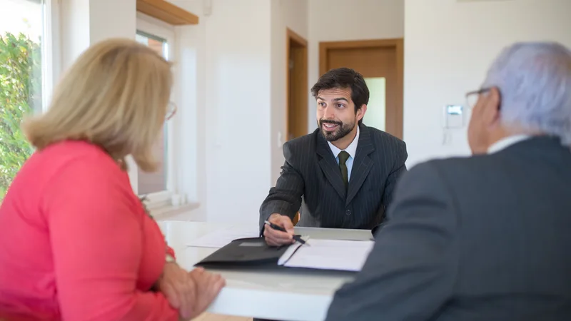 Financial advisor explaining Credit Cube loan options and emergency resources