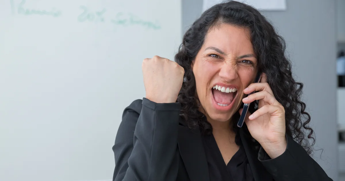 Credit Cube loan review 2026 — approved woman celebrating