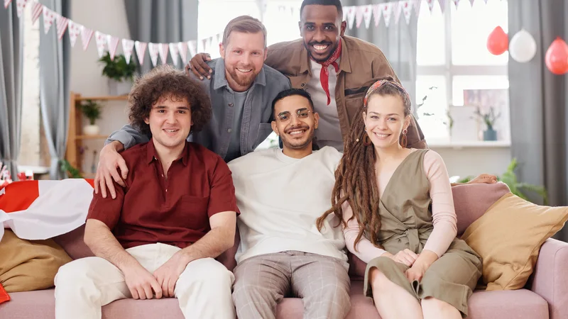 Diverse group of satisfied Credit Cube borrowers — happy customers sharing their experience